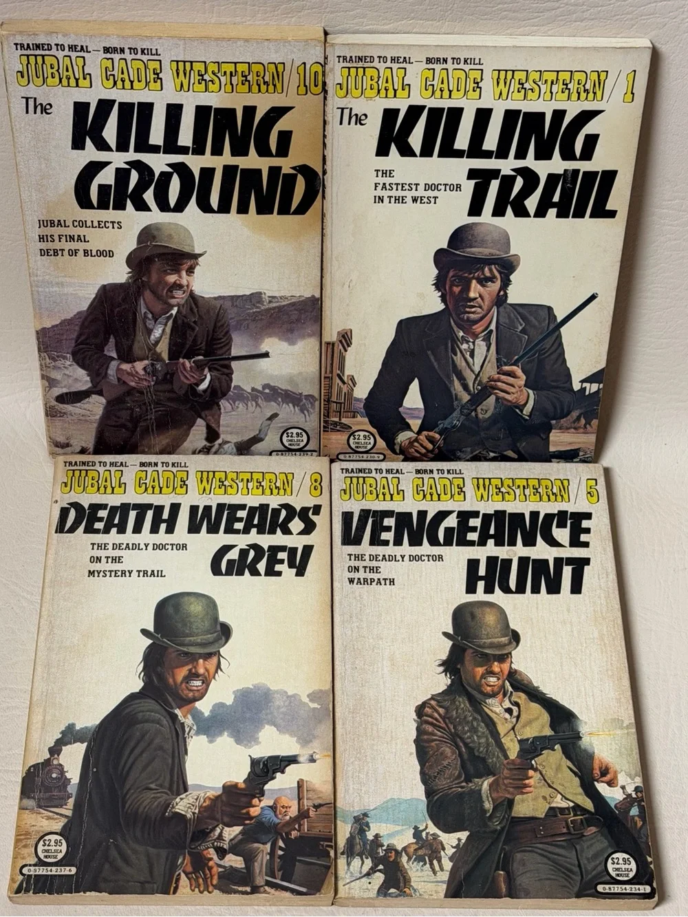 Vintage set of (4 ) JUBAL CADE WESTERNS Paperback Books